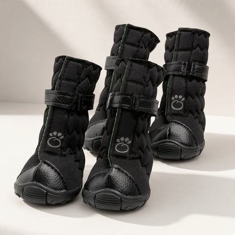 Snow Paws™ GF Pet Stretch Winter Dog Boots in black on a white tabletop